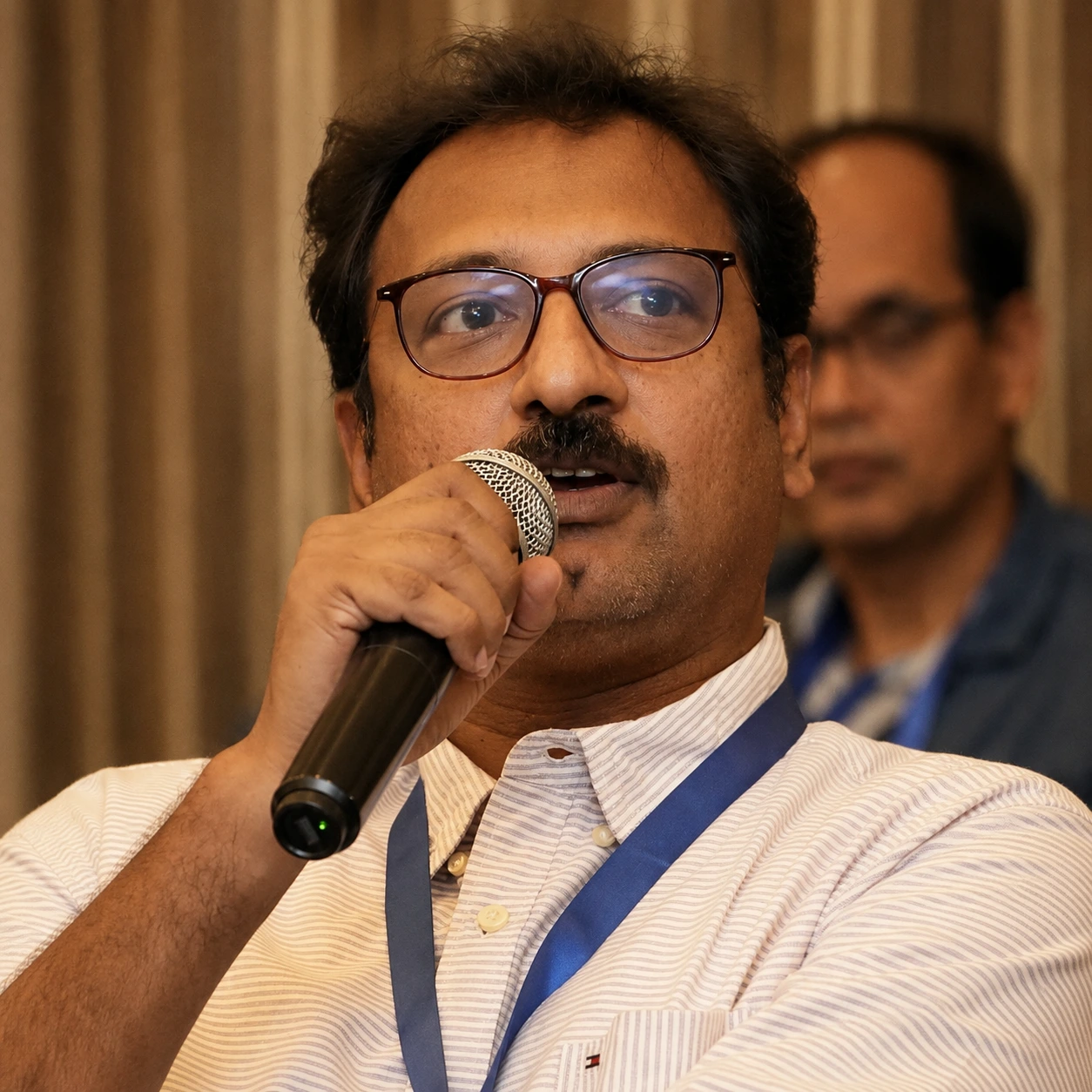 Shankar Jayaraman, Founder and CEO of CISOGenie, speaking at an event